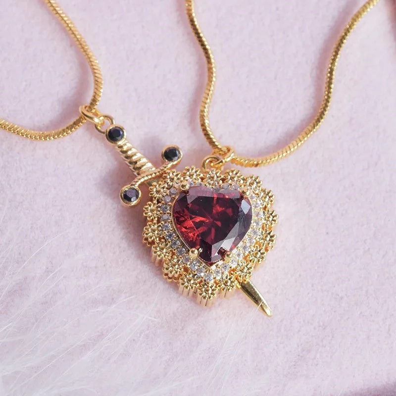 Heart and sword necklace T